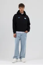 Sweat-shirt oversize noir imprimé au dos