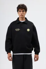 Sweat-shirt noir oversize à col polo imprimé délavé