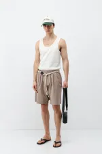 Short oversize en lin couleur pierre, ceinturé