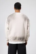 Sweat-shirt oversize imprimé délavé couleur pierre