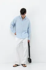 Chemise oversize bleue aspect lin texturé