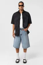 Chemise oversize en popeline délavée noire