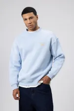 Sweat-shirt oversize à col rond imprimé bleu ciel