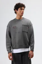 Sweat-shirt oversize à col rond et poches, noir