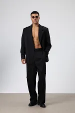 Costume noir oversize ceinturé