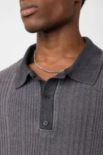 Polo à col oversize en maille noire