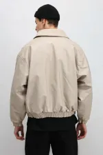 Blouson aviateur oversize en cuir couleur pierre