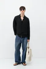 Chemise oversize légèrement texturée noire