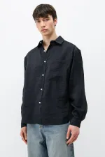 Chemise oversize en modal avec poches, noire