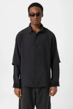 Chemise noire oversize à double manche