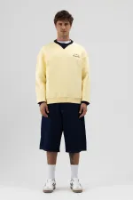 Sweat-shirt jaune oversize à col rond imprimé