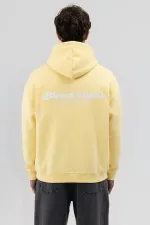 Sweat-shirt à capuche oversize imprimé jaune