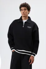Sweat-shirt noir oversize à col polo