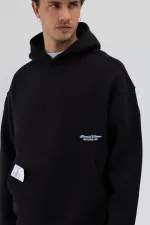 Sweat-shirt à capuche oversize imprimé noir