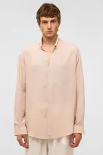 Chemise oversize à manches longues en lin beige