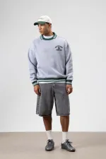 Sweat-shirt gris chiné à col oversize brodé