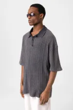 Polo à col oversize en maille noire