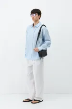 Chemise oversize bleue aspect lin texturé