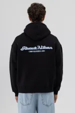 Sweat-shirt à capuche oversize imprimé noir