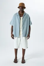 Yıkamalı Oversize Arka Baskılı Kısa Kol Cepsiz Gömlek Açık Gri