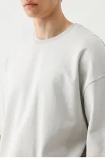 Short-sleeved washed oversize t-shirt, light gray.