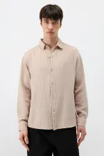 Chemise oversize beige en coton texturé