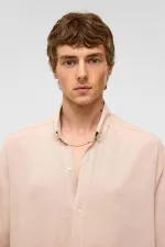 Chemise oversize à manches longues en lin beige