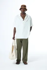 Chemise oversize délavée à manches courtes imprimée au dos, sans poches, écru