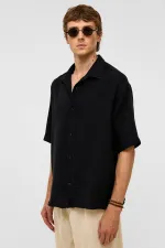 Chemise oversize à manches courtes en mousseline, noire