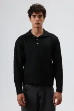 Pull en maille douce texturée à col polo noir