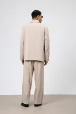 Costume oversize ceinturé couleur pierre