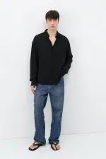 Chemise oversize légèrement texturée noire