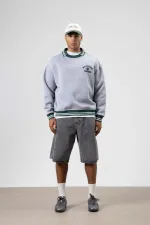 Sweat-shirt gris chiné à col oversize brodé