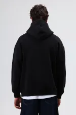 Sweat à capuche imprimé oversize noir