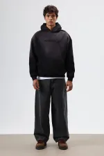 Sweat à capuche noir oversize imprimé et délavé