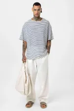 T-shirt rayé oversize en maille (bleu marine)