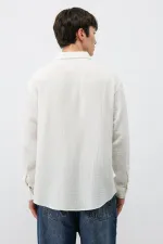 Chemise oversize blanche en coton texturé