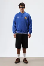 Sweat-shirt oversize à col rond imprimé bleu marine