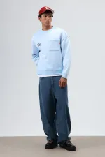 Sweat-shirt oversize à col rond et poches, bleu clair