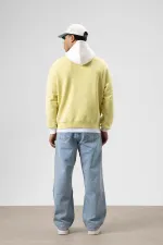 Sweat à capuche imprimé oversize jaune