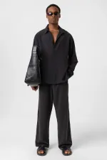 Chemise noire oversize à double manche