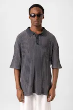 Polo à col oversize en maille noire