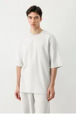 Short-sleeved washed oversize t-shirt, light gray.