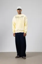 Sweat-shirt jaune oversize imprimé et délavé