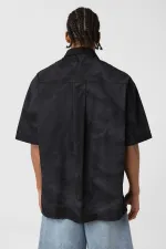 Chemise oversize en popeline délavée noire