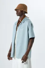 Yıkamalı Oversize Arka Baskılı Kısa Kol Cepsiz Gömlek Açık Gri