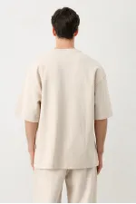 T-shirt oversize délavé à manches courtes couleur pierre.