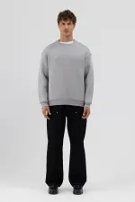 Sweat-shirt gris basique à col rond et coupe oversize