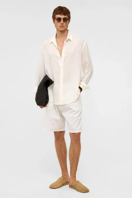 Chemise blanche oversize à manches longues en lin