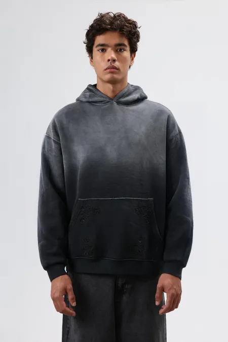 Sweat à capuche oversize noir avec détails brodés
